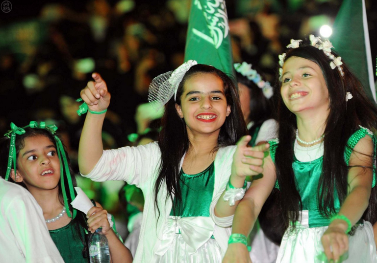 Saudi youth celebrate the Kingdom's National Day. Photo via SPA.gov.sa.