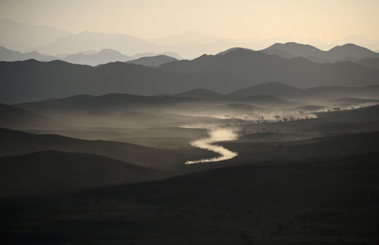 TOPSHOT - Monster Energy Honda Team 2020's Kevin Benavides of Argentina rides his Honda  CRF 450 Rally motorbike during the Stage 2 of the Dakar 2020 between Al Wajh and Neom, Saudi Arabia, on January 6, 2020. (Photo by FRANCK FIFE / AFP) (Photo by FRANCK FIFE/AFP via Getty Images)