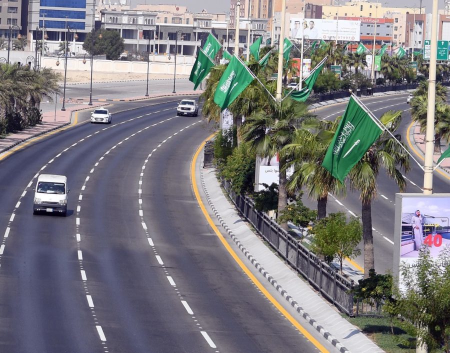 Flags alongside a road in Saudi Arabia to celebrate its 90th national day.